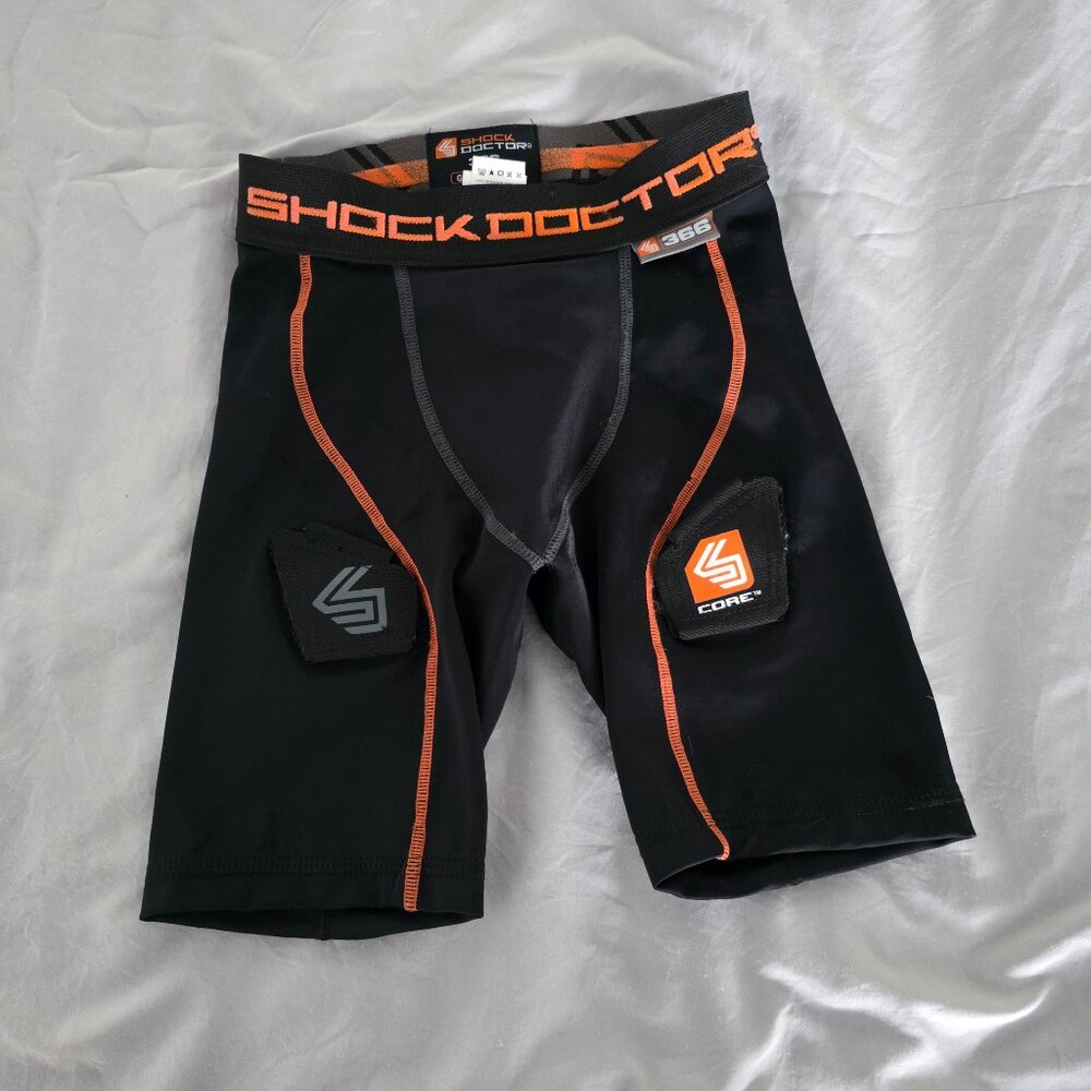 Shock Doctor hockey shorts with velcro for socks